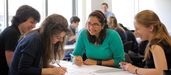 Four students working